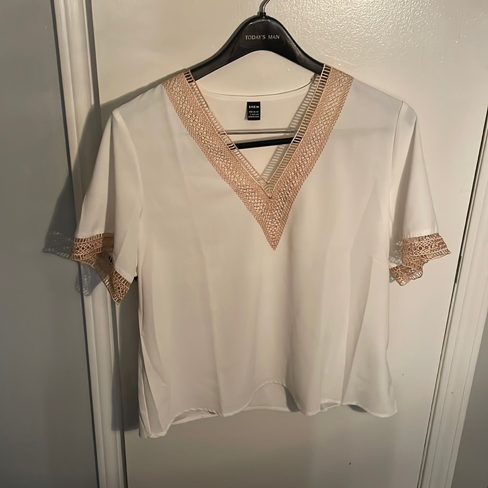 White and gold shirt